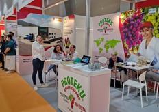 The Proteku team taking a moment before the next round of visitors come around.